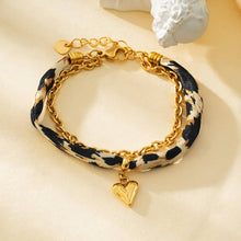 Afbeelding in Gallery-weergave laden, Eclat Paris - Leopard Fabric Bracelet with Gold Chain and Heart Pendant